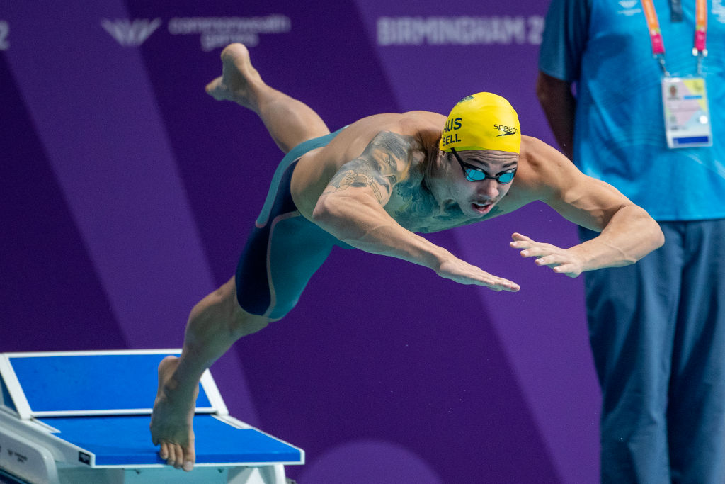 Grayson Bell dicing into the pool at the Birmingham 2022 Commonwealth Games.