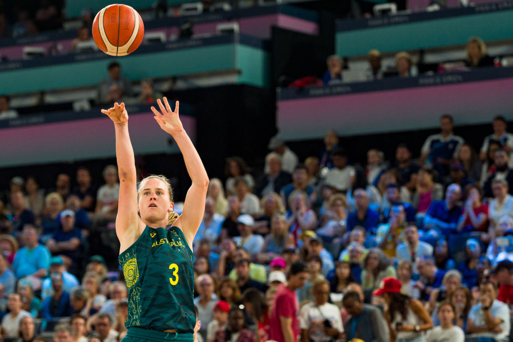 Kristy Wallace shooting a basketball at the Paris 2024 Olympic Games. 